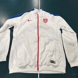 Nike White Track Jacket with Red Trim and Blue Accents
